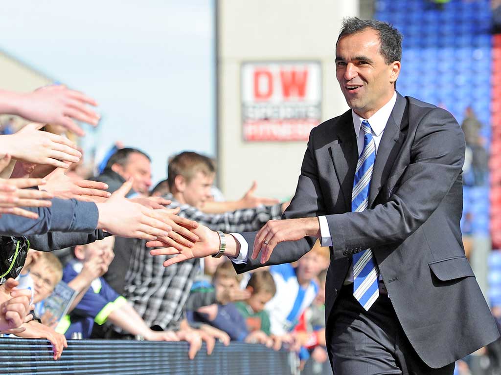 Roberto Martinez laps up the acclaim of the Wigan supporters
